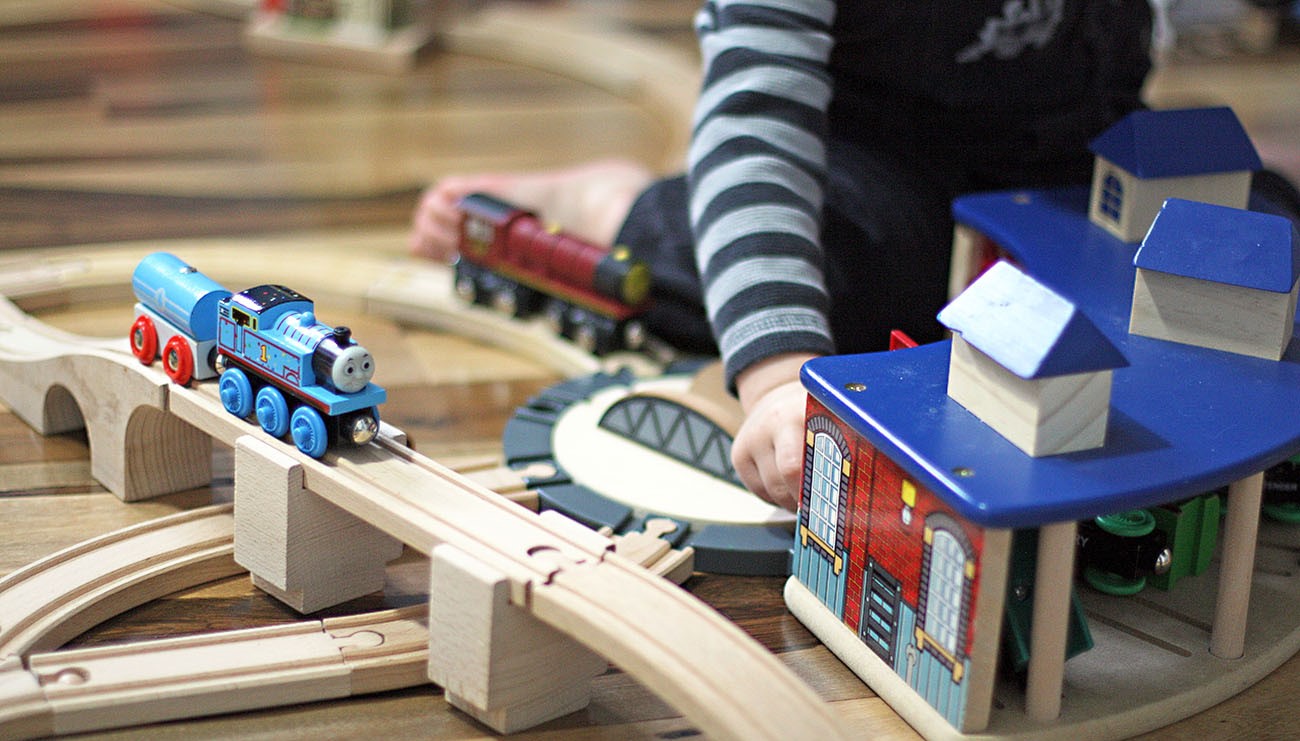 Toy train tracks and trains
